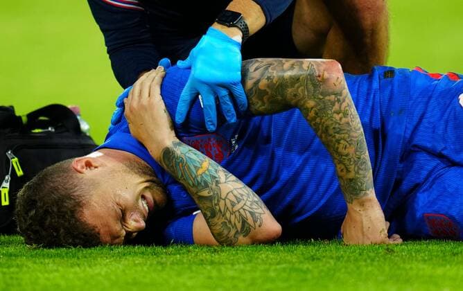 Mandatory Credit: Photo by Javier Garcia Shutterstock (12975315p) An Injury scare for Kieran Trippier of England as he recieves treatment on his shoulder Germany v England, UEFA Nations League, Group C, International Football, Allianz Arena, Munich, Germany - 07 Jun 2022 EDITORIAL USE ONLY No use with unauthorised audio, video, data, fixture lists, club league logos or live services. Online in-match use limited to 120 images, no video emulation. No use in betting, games or single club league player publications. Germany v England, UEFA Nations League, Group C, International Football, Allianz Arena, Munich, Germany - 07 Jun 2022 EDITORIAL USE ONLY No use with unauthorised audio, video, data, fixture lists, club league logos or live services. Online in-match use limited to 120 images, no video emulation. No use in betting, games or single club league player publications. Copyright: xJavierxGarcia Shutterstockx 12975315p