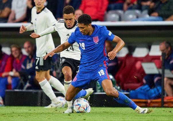 Jamal Musiala, DFB 14 compete for the ball, tackling, duel, header, zweikampf, action, fight against Jude Bellingham, England 19 in the UEFA Nations League 2022 match GERMANY - ENGLAND in Season 2022 2023 on Juni 07, 2022 in Munich, Germany.