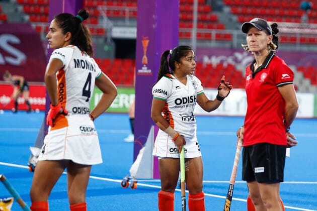 July 11, 2022, TERRASSA, BARCELONA, SPAIN: Monika, Neha and Janneke Schopman , head coach of India looks on during the FIH Hockey Women s World Cup 2022, 9th - 16th, hockey match played between Canada and India at Estadi Olimpic on July 11, 2022, in Terrassa, Barcelona, Spain. TERRASSA SPAIN - ZUMAa181 20220711_zaa_a181_052 Copyright: xIrinaxR.xHx