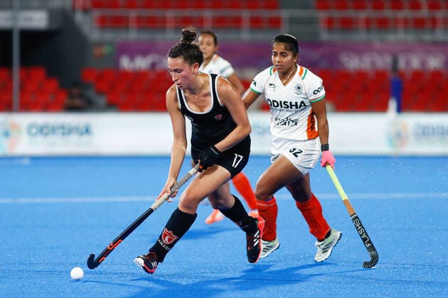 July 11, 2022, TERRASSA, BARCELONA, SPAIN: Sara McManus of Canada and Neha of India in action during the FIH Hockey Women s World Cup 2022, 9th - 16th, hockey match played between Canada and India at Estadi Olimpic on July 11, 2022, in Terrassa, Barcelona, Spain. TERRASSA SPAIN - ZUMAa181 20220711_zaa_a181_091 Copyright: xIrinaxR.xHx
