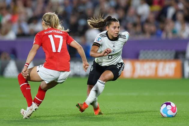 Mandatory Credit: Photo by Simon Dael Shutterstock (13040203aa) Lena Oberdorf of Germany turns Sarah Puntigam of Austria Germany v Austria, Womens UEFA European Championship, EM, Europameisterschaft Quarter Final, Football, Brentford Community Stadium, London, UK - 21 Jul 2022 Germany v Austria, Womens UEFA European Championship, Quarter Final, Football, Brentford Community Stadium, London, UK - 21 Jul 2022 Copyright: xSimonxDael Shutterstockx 13040203aa