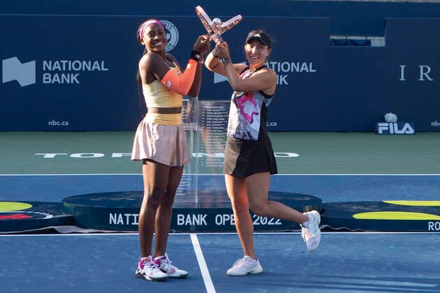 August 14, 2022, TORONTO, ON, CAN: Coco Gauff, left, and Jessica Pegula, of the United States, hold aloft the trophy after defeating Nicole Melichar-Martinez, of the United States and Ellen Perez, of Australia, during the National Bank Open double finals tennis tournament in Toronto on Sunday, August 14, 2022. Coco Gauff; Jessica Pegula - ZUMAc35_ 20220814_zaf_c35_169 Copyright: xChrisxYoungx