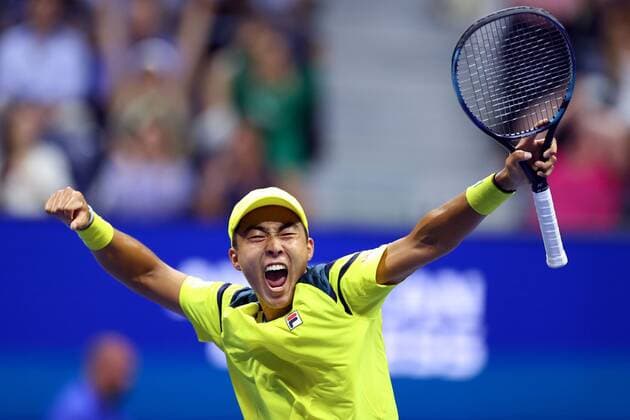 Mandatory Credit: Photo by Ella Ling Shutterstock (13352655bw) Rinky Hijikata celebrates during his first round match US Open Championships 2022, Day Two, USTA National Tennis Center, Flushing Meadows, New York, USA - 30 Aug 2022 EDITORIAL USE ONLY No use with unauthorised audio, video, data, fixture lists, club league logos or live services. Online in-match use limited to 120 images, no video emulation. No use in betting, games or single club league player publications. US Open Championships 2022, Day Two, USTA National Tennis Center, Flushing Meadows, New York, USA - 30 Aug 2022 EDITORIAL USE ONLY No use with unauthorised audio, video, data, fixture lists, club league logos or live services. Online in-match use limited to 120 images, no video emulation. No use in betting, games or single club league player publications. Copyright: xEllaxLing Shutterstockx 13352655bw