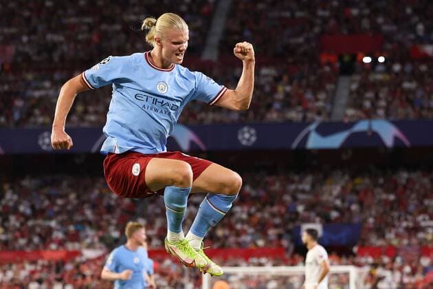 Mandatory Credit: Photo by Simon Dael Shutterstock (13368486o) Erling Haland of Manchester City celebrates after scoring a goal (3-0) Sevilla v Manchester City, UEFA Champions League, Group G, Football, Estadio Ramon Sanchez-Pizjuan, Seville, Spain - 6 Sep 2022 EDITORIAL USE ONLY No use with unauthorised audio, video, data, fixture lists, club league logos or live services. Online in-match use limited to 120 images, no video emulation. No use in betting, games or single club league player publications. Sevilla v Manchester City, UEFA Champions League, Group G, Football, Estadio Ramon Sanchez-Pizjuan, Seville, Spain - 6 Sep 2022 EDITORIAL USE ONLY No use with unauthorised audio, video, data, fixture lists, club league logos or live services. Online in-match use limited to 120 images, no video emulation. No use in betting, games or single club league player publications. Copyright: xSimonxDael Shutterstockx 13368486o