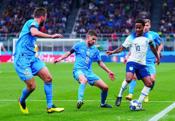 Mandatory Credit: Photo by Javier Garcia Shutterstock (13413805ao) Raheem Sterling of England surrounded by the Italian defence and Jorginho, Nicolò Barella and Bryan Cristante of Italy Italy v England, UEFA Nations League, Group A3, International Football, Stadio Giuseppe Meazza, Milan, Italy - 23 Sep 2022 EDITORIAL USE ONLY No use with unauthorised audio, video, data, fixture lists, club league logos or live services. Online in-match use limited to 120 images, no video emulation. No use in betting, games or single club league player publications. Italy v England, UEFA Nations League, Group A3, International Football, Stadio Giuseppe Meazza, Milan, Italy - 23 Sep 2022 EDITORIAL USE ONLY No use with unauthorised audio, video, data, fixture lists, club league logos or live services. Online in-match use limited to 120 images, no video emulation. No use in betting, games or single club league player publications. Copyright: xJavierxGarcia Shutterstockx 13413805ao