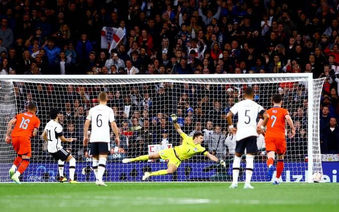 Mandatory Credit: Photo by Kieran McManus Shutterstock (13421401cg) Ilkay Gundogan of Germany scores the opening goal from the penalty spot. England v Germany, UEFA Nations League, Group A3, International Football, Wembley Stadium, London, UK - 26 Sep 2022 EDITORIAL USE ONLY No use with unauthorised audio, video, data, fixture lists, club league logos or live services. Online in-match use limited to 120 images, no video emulation. No use in betting, games or single club league player publications. England v Germany, UEFA Nations League, Group A3, International Football, Wembley Stadium, London, UK - 26 Sep 2022 EDITORIAL USE ONLY No use with unauthorised audio, video, data, fixture lists, club league logos or live services. Online in-match use limited to 120 images, no video emulation. No use in betting, games or single club league player publications. Copyright: xKieranxMcManus Shutterstockx 13421401cg