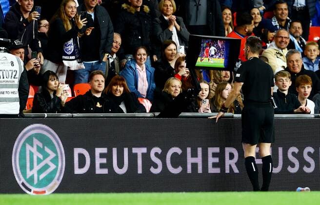 Mandatory Credit: Photo by Kieran McManus Shutterstock (13421401ce) Referee lDanny Makkelie looks at the VAR monitor. England v Germany, UEFA Nations League, Group A3, International Football, Wembley Stadium, London, UK - 26 Sep 2022 EDITORIAL USE ONLY No use with unauthorised audio, video, data, fixture lists, club league logos or live services. Online in-match use limited to 120 images, no video emulation. No use in betting, games or single club league player publications. England v Germany, UEFA Nations League, Group A3, International Football, Wembley Stadium, London, UK - 26 Sep 2022 EDITORIAL USE ONLY No use with unauthorised audio, video, data, fixture lists, club league logos or live services. Online in-match use limited to 120 images, no video emulation. No use in betting, games or single club league player publications. Copyright: xKieranxMcManus Shutterstockx 13421401ce