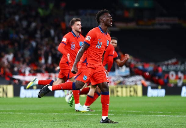 Mandatory Credit: Photo by Kieran McManus Shutterstock (13421401cz) Bukayo Saka of England celebrates his sides second goal scored by Mason Mount. England v Germany, UEFA Nations League, Group A3, International Football, Wembley Stadium, London, UK - 26 Sep 2022 EDITORIAL USE ONLY No use with unauthorised audio, video, data, fixture lists, club league logos or live services. Online in-match use limited to 120 images, no video emulation. No use in betting, games or single club league player publications. England v Germany, UEFA Nations League, Group A3, International Football, Wembley Stadium, London, UK - 26 Sep 2022 EDITORIAL USE ONLY No use with unauthorised audio, video, data, fixture lists, club league logos or live services. Online in-match use limited to 120 images, no video emulation. No use in betting, games or single club league player publications. Copyright: xKieranxMcManus Shutterstockx 13421401cz
