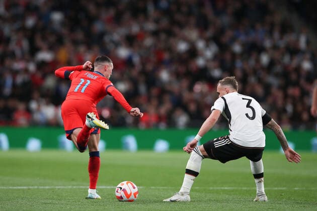 Mandatory Credit: Photo by Matt Impey Shutterstock (13422173ad) Phil Foden of England does a flick to beat David Raum of Germany England v Germany, Football, UEFA Nations Cup, Wembley Stadium, Wembley, London, UK - 26 09 2022 Editorial use only England v Germany, Football, UEFA Nations Cup, Wembley Stadium, Wembley, London, UK - 26 09 2022 Editorial use only Copyright: xMattxImpey Shutterstockx 13422173ad