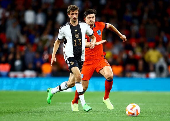 Mandatory Credit: Photo by Kieran McManus Shutterstock (13421401fa) Thomas Muller of Germany and Harry Maguire of England. England v Germany, UEFA Nations League, Group A3, International Football, Wembley Stadium, London, UK - 26 Sep 2022 EDITORIAL USE ONLY No use with unauthorised audio, video, data, fixture lists, club league logos or live services. Online in-match use limited to 120 images, no video emulation. No use in betting, games or single club league player publications. England v Germany, UEFA Nations League, Group A3, International Football, Wembley Stadium, London, UK - 26 Sep 2022 EDITORIAL USE ONLY No use with unauthorised audio, video, data, fixture lists, club league logos or live services. Online in-match use limited to 120 images, no video emulation. No use in betting, games or single club league player publications. Copyright: xKieranxMcManus Shutterstockx 13421401fa