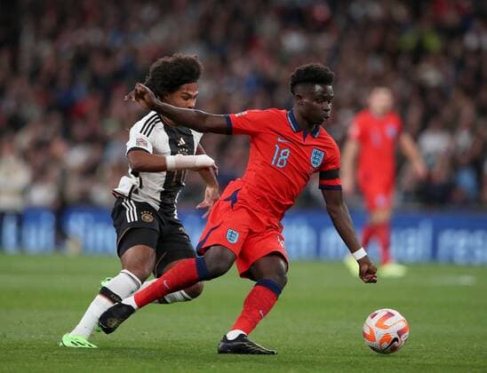 Mandatory Credit: Photo by Matt Impey Shutterstock (13422173bj) Bukayo Saka of England gets away from Serge Gnabry of Germany England v Germany, Football, UEFA Nations Cup, Wembley Stadium, Wembley, London, UK - 26 09 2022 Editorial use only England v Germany, Football, UEFA Nations Cup, Wembley Stadium, Wembley, London, UK - 26 09 2022 Editorial use only Copyright: xMattxImpey Shutterstockx 13422173bj