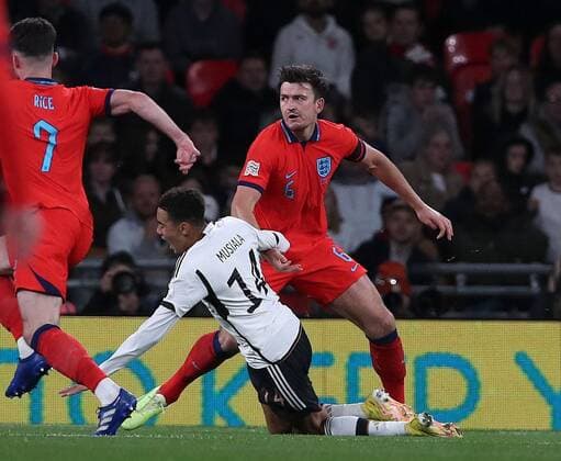 Mandatory Credit: Photo by Matt Impey Shutterstock (13422173bq) Harry Maguire of England fouls Jamal Musiala of Germany for a penalty England v Germany, Football, UEFA Nations Cup, Wembley Stadium, Wembley, London, UK - 26 09 2022 Editorial use only England v Germany, Football, UEFA Nations Cup, Wembley Stadium, Wembley, London, UK - 26 09 2022 Editorial use only Copyright: xMattxImpey Shutterstockx 13422173bq