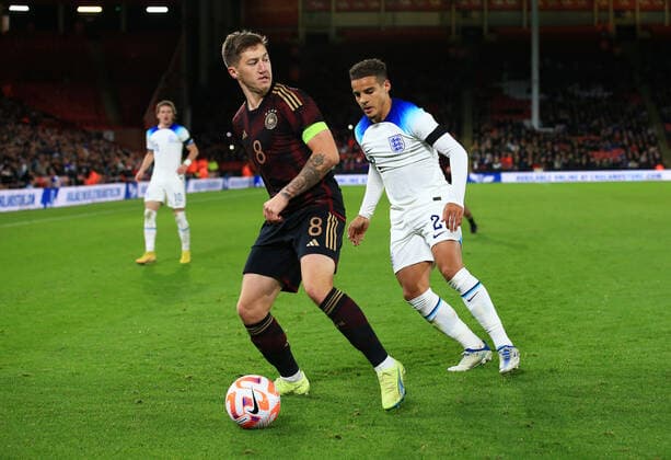 Mandatory Credit: Photo by Matt West Shutterstock (13423132dz) Angelo Stiller of Germany and Max Aarons of England England U21, U 21 v Germany U21, Friendly, International Football, Bramall Lane, Sheffield, UK - 27 Sep 2022 EDITORIAL USE ONLY No use with unauthorised audio, video, data, fixture lists, club league logos or live services. Online in-match use limited to 120 images, no video emulation. No use in betting, games or single club league player publications. England U21 v Germany U21, Friendly, International Football, Bramall Lane, Sheffield, UK - 27 Sep 2022 EDITORIAL USE ONLY No use with unauthorised audio, video, data, fixture lists, club league logos or live services. Online in-match use limited to 120 images, no video emulation. No use in betting, games or single club league player publications. Copyright: xMattxWest Shutterstockx 13423132dz