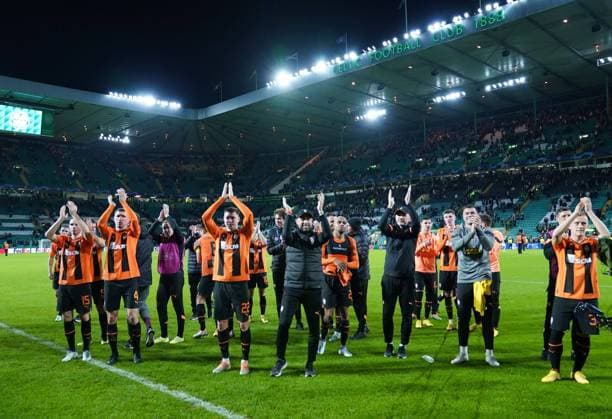 Mandatory Credit: Photo by Stuart Wallace Shutterstock (13491469ba) Shakhtar Donetsk players and Head Coach Igor Jovicevic applaud the Shakhtar fans after drawing 1-1. Celtic v Shakhtar Donetsk, UEFA Champions League, Group F, Football, Celtic Park, Glasgow, UK - 25 Oct 2022 EDITORIAL USE ONLY No use with unauthorised audio, video, data, fixture lists, club league logos or live services. Online in-match use limited to 120 images, no video emulation. No use in betting, games or single club league player publications. Celtic v Shakhtar Donetsk, UEFA Champions League, Group F, Football, Celtic Park, Glasgow, UK - 25 Oct 2022 EDITORIAL USE ONLY No use with unauthorised audio, video, data, fixture lists, club league logos or live services. Online in-match use limited to 120 images, no video emulation. No use in betting, games or single club league player publications. Copyright: xStuartxWallace Shutterstockx 13491469ba