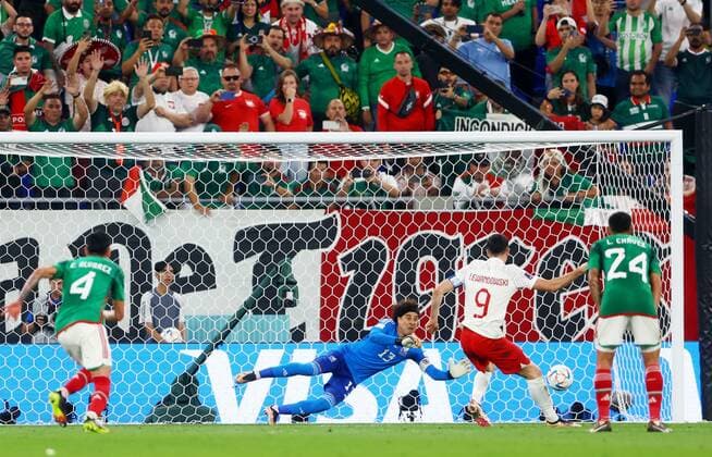 Mandatory Credit: Photo by Kieran McManus Shutterstock (13626428bc) Robert Lewandowski of Poland sees his penalty saved y Goalkeeper Guillermo Ochoa of Mexico. Mexico v Poland, FIFA World Cup, WM, Weltmeisterschaft, Fussball 2022, Group C, Football, Stadium 974, Doha, Qatar - 22 Nov 2022 Editorial Use Only Mexico v Poland, FIFA World Cup 2022, Group C, Football, Stadium 974, Doha, Qatar - 22 Nov 2022 Editorial Use Only Copyright: xKieranxMcManus Shutterstockx 13626428bc