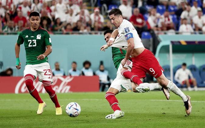 Mandatory Credit: Photo by Michael Zemanek Shutterstock (13626433bc) Robert Lewandowski of Poland is fouled by Hector Moreno of Mexico for a penalty. Mexico v Poland, FIFA World Cup, WM, Weltmeisterschaft, Fussball 2022, Group C, Football, Stadium 974, Doha, Qatar - 22 Nov 2022 Editorial Use Only Mexico v Poland, FIFA World Cup 2022, Group C, Football, Stadium 974, Doha, Qatar - 22 Nov 2022 Editorial Use Only Copyright: xMichaelxZemanek Shutterstockx 13626433bc