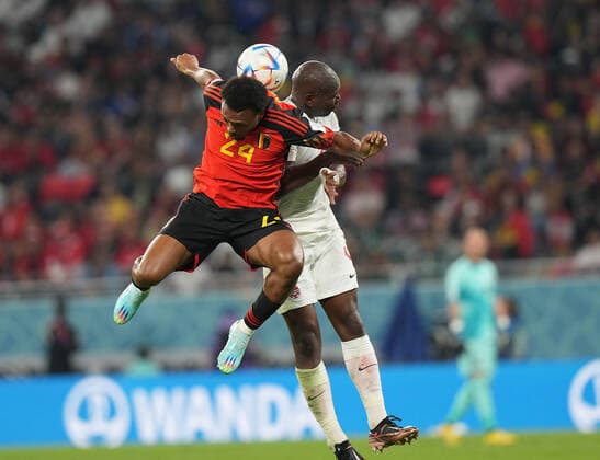 QAT, WM FIFA 2022, Group F, Belgien vs Kanada 23.11.2022, Khalifa International Stadium, Doha, QAT, WM FIFA 2022, Group F, Belgien vs Kanada, im Bild Belgium s forward Lois Openda , Canada s defender Kamal Miller .