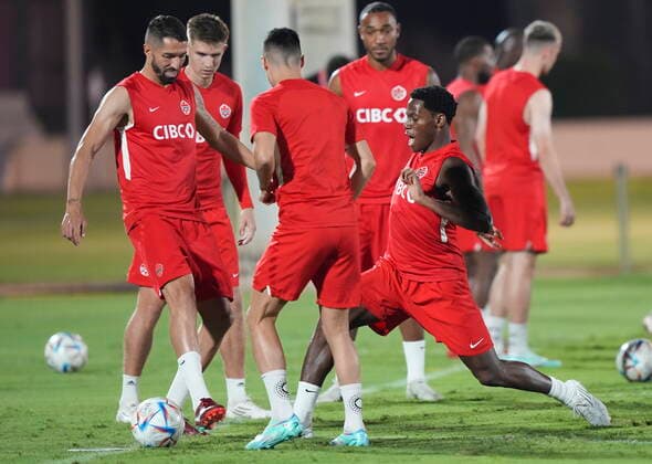 November 25, 2022, DOHA, QATAR: Canada forward Jonathan David, right, battles for the loose ball against teammates during practice at the World Cup in Doha, Qatar, Friday, Nov. 25, 2022. Canada News - November 25, 2022 - ZUMAc35_ 20221125_zaf_c35_038 Copyright: xNathanxDenettex