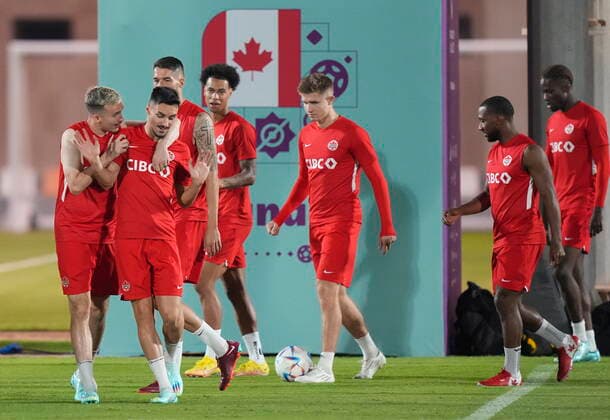 November 25, 2022, DOHA, QATAR: Canada forward Liam Millar, left, jokes around with Canada midfielder Stephen Eustaquio, second left, during practice at the World Cup in Doha, Qatar, Friday, Nov. 25, 2022. Canada News - November 25, 2022 - ZUMAc35_ 20221125_zaf_c35_040 Copyright: xNathanxDenettex