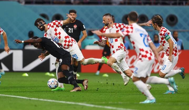 Mandatory Credit: Photo by Kieran McManus Shutterstock (13634907bf) Josko Gvardiol of Croatia fouls Alphonso Davies of Canada Croatia v Canada, FIFA World Cup, WM, Weltmeisterschaft, Fussball 2022, Group F, Football, Khalifa International Stadium, Ar-Rayyan, Qatar - 27 Nov 2022 Editorial Use Only Croatia v Canada, FIFA World Cup 2022, Group F, Football, Khalifa International Stadium, Ar-Rayyan, Qatar - 27 Nov 2022 Editorial Use Only Copyright: xKieranxMcManus Shutterstockx 13634907bf