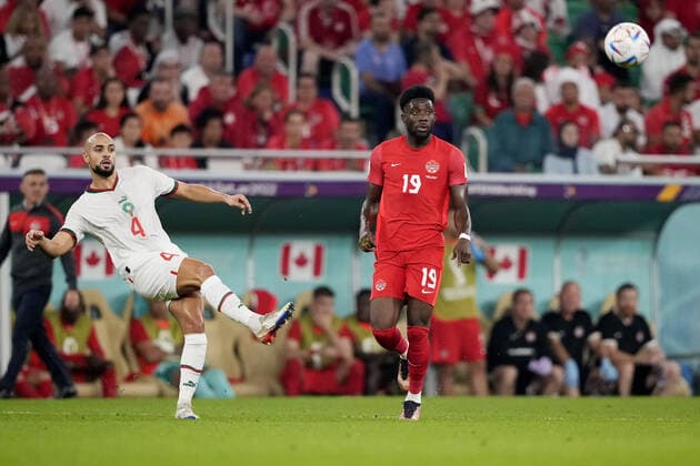 Mandatory Credit: Photo by Dave Shopland Shutterstock (13640369bm) Sofyan Amrabat of Morocco and Alphonso Davies of Canada. Canada v Morocco, FIFA World Cup, WM, Weltmeisterschaft, Fussball 2022, Group F, Football, Al Thumama Stadium, Doha, Qatar - 01 Dec 2022 Editorial Use Only Canada v Morocco, FIFA World Cup 2022, Group F, Football, Al Thumama Stadium, Doha, Qatar - 01 Dec 2022 Editorial Use Only Copyright: xDavexShopland Shutterstockx 13640369bm