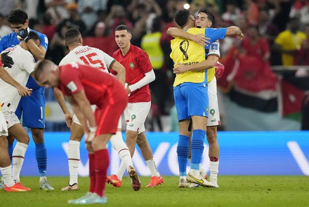 Mandatory Credit: Photo by Dave Shopland Shutterstock (13640369dm) Nayef Aguerd of Morocco and team mates celebrate at full time. Canada v Morocco, FIFA World Cup, WM, Weltmeisterschaft, Fussball 2022, Group F, Football, Al Thumama Stadium, Doha, Qatar - 01 Dec 2022 Editorial Use Only Canada v Morocco, FIFA World Cup 2022, Group F, Football, Al Thumama Stadium, Doha, Qatar - 01 Dec 2022 Editorial Use Only Copyright: xDavexShopland Shutterstockx 13640369dm