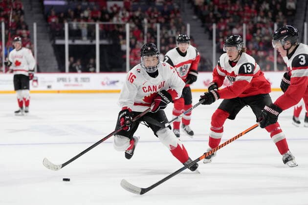 December 29, 2022, Halifax, NS, Canada: Canada™s Connor Bedard, left, skates past Austria™s Lukas Horl, right, and Luca Auer during second period IIHF World Junior Hockey Championship action in Halifax on Thursday, December 29, 2022. Connor Bedard, Lukas Horl, Luca Auer - ZUMAc35_ 20221229_zaf_c35_063 Copyright: xDarrenxCalabresex