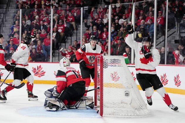 December 29, 2022, Halifax, NS, Canada: Canada™s Colton Dach, right, and Zack Ostapchuk, left, react to a goal in front of Austria s Tim Geifes, second from right, and goaltender Benedikt Oschgan during second period IIHF World Junior Hockey Championship action in Halifax on Thursday, December 29, 2022. Colton Dach, Zack Ostapchuk, Tim Geifes, Benedikt Oschgan - ZUMAc35_ 20221229_zaf_c35_068 Copyright: xDarrenxCalabresex