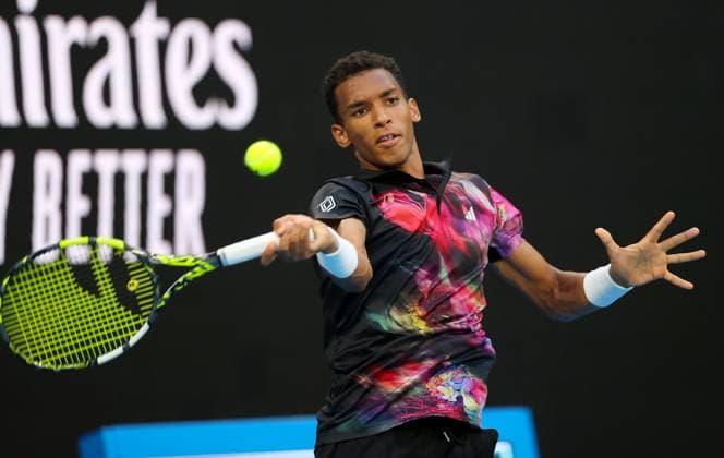 Mandatory Credit: Photo by Ella Ling Shutterstock (13714308ea) Felix Auger Aliassime of Canada in action Australian Open, Day One, Tennis, Melbourne Park, Melbourne, Australia - 16 Jan 2023 Australian Open, Day One, Tennis, Melbourne Park, Melbourne, Australia - 16 Jan 2023 Copyright: xEllaxLing Shutterstockx 13714308ea