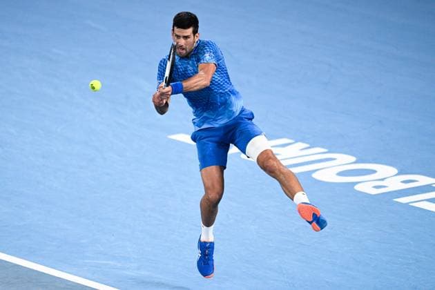 Mandatory Credit: Photo by James Gourley Shutterstock (13716760hj) Novak Djokovic in action during his first round match Australian Open, Day Two, Tennis, Melbourne Park, Melbourne, Australia - 17 Jan 2023 Australian Open, Day Two, Tennis, Melbourne Park, Melbourne, Australia - 17 Jan 2023 Copyright: xJamesxGourley Shutterstockx 13716760hj