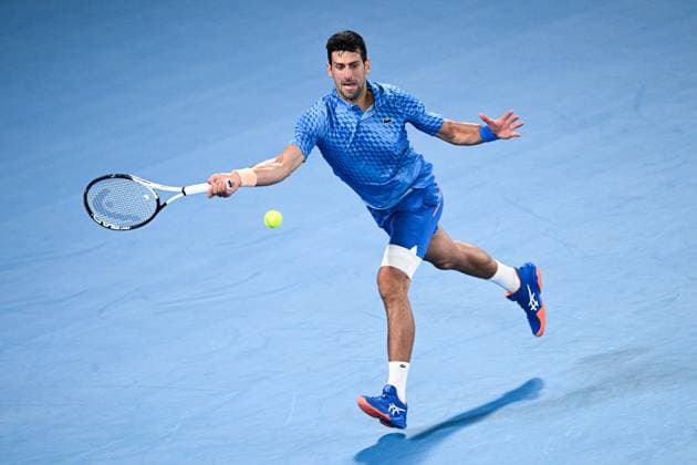 Mandatory Credit: Photo by James Gourley Shutterstock (13716760hq) Novak Djokovic in action during his first round match Australian Open, Day Two, Tennis, Melbourne Park, Melbourne, Australia - 17 Jan 2023 Australian Open, Day Two, Tennis, Melbourne Park, Melbourne, Australia - 17 Jan 2023 Copyright: xJamesxGourley Shutterstockx 13716760hq