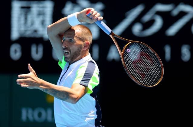 Mandatory Credit: Photo by Ella Ling Shutterstock (13728748ax) Dan Evans of GBR in action Australian Open, Day Six, Tennis, Melbourne Park, Melbourne, Australia - 21 Jan 2023 Australian Open, Day Six, Tennis, Melbourne Park, Melbourne, Australia - 21 Jan 2023 Copyright: xEllaxLing Shutterstockx 13728748ax