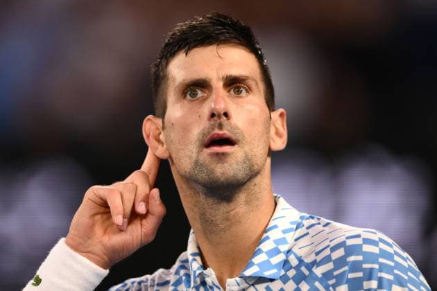 Mandatory Credit: Photo by James Gourley Shutterstock (13736332fa) Novak Djokovic of Serbia celebrates winning the set Australian Open, Day Twelve, Tennis, Melbourne Park, Melbourne, Australia - 27 Jan 2023 Australian Open, Day Twelve, Tennis, Melbourne Park, Melbourne, Australia - 27 Jan 2023 Copyright: xJamesxGourley Shutterstockx 13736332fa