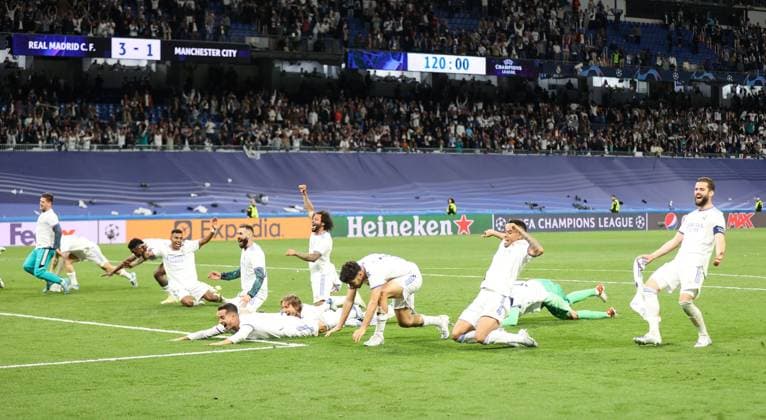 Mandatory Credit: Photo by ANL Shutterstock (13743794g) Real Madrid players celebrate Real Madrid v Manchester City, Champions League semi-finals, 2nd leg Andy Hooper Daily Mail Real Madrid v Manchester City, Bernabeu, Spain - 04 May 2022 EDITORIAL USE ONLY No use with unauthorised audio, video, data, fixture lists, club league logos or live services. Online in-match use limited to 120 images, no video emulation. No use in betting, games or single club league player publications. Consent for book publication must be agreed with Shutterstock before use. It is the picture user s responsibility to adhere to all restrictions Real Madrid v Manchester City, Bernabeu, Spain - 04 May 2022 EDITORIAL USE ONLY No use with unauthorised audio, video, data, fixture lists, club league logos or live services. Online in-match use limited to 120 images, no video emulation. No use in betting, games or single club league player publications. Consent Copyright: xANL Shutterstockx 13743794g
