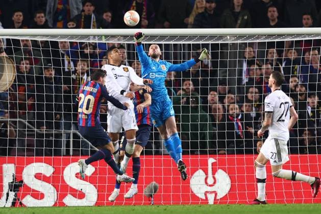 Mandatory Credit: Photo by Simon Dael Shutterstock (13765759bh) David De Gea of Manchester United, ManU punches clear Barcelona v Manchester United, UEFA Europa League, Play-Off Round, First Leg, Football, Camp Nou, Barcelona, Spain - 16 Feb 2023 EDITORIAL USE ONLY No use with unauthorised audio, video, data, fixture lists, club league logos or live services. Online in-match use limited to 120 images, no video emulation. No use in betting, games or single club league player publications. Barcelona v Manchester United, UEFA Europa League, Play-Off Round, First Leg, Football, Camp Nou, Barcelona, Spain - 16 Feb 2023 EDITORIAL USE ONLY No use with unauthorised audio, video, data, fixture lists, club league logos or live services. Online in-match use limited to 120 images, no video emulation. No use in betting, games or single club league player publications. Copyright: xSimonxDael Shutterstockx 13765759bh