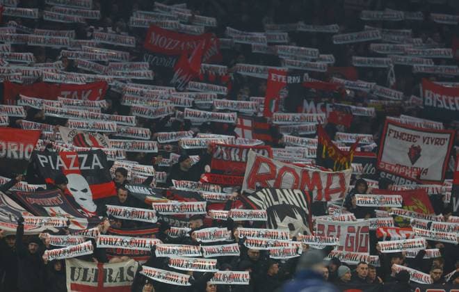 Mandatory Credit: Photo by Kieran McManus Shutterstock (13794852ce) AC Milan fans hold scarves in the air Tottenham Hotspur v AC Milan, UEFA Champions League, Round of 16, Second Leg, Football, Tottenham Hotspur Stadium, London, UK - 08 Mar 2023 EDITORIAL USE ONLY No use with unauthorised audio, video, data, fixture lists, club league logos or live services. Online in-match use limited to 120 images, no video emulation. No use in betting, games or single club league player publications. Tottenham Hotspur v AC Milan, UEFA Champions League, Round of 16, Second Leg, Football, Tottenham Hotspur Stadium, London, UK - 08 Mar 2023 EDITORIAL USE ONLY No use with unauthorised audio, video, data, fixture lists, club league logos or live services. Online in-match use limited to 120 images, no video emulation. No use in betting, games or single club league player publications. Copyright: xKieranxMcManus Shutterstockx 13794852ce