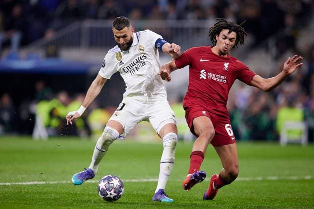 Mandatory Credit: Photo by Ruben Albarran Shutterstock (13824737bv) Karim Benzema of Real Madrid and Trent Alexander-Arnold of Liverpool FC Real Madrid v Liverpool, UEFA Champions League, Round of 16, Second Leg, Football, Santiago Bernabeu Stadium, Madrid, Spain - 15 Mar 2023 EDITORIAL USE ONLY No use with unauthorised audio, video, data, fixture lists, club league logos or live services. Online in-match use limited to 120 images, no video emulation. No use in betting, games or single club league player publications. Real Madrid v Liverpool, UEFA Champions League, Round of 16, Second Leg, Football, Santiago Bernabeu Stadium, Madrid, Spain - 15 Mar 2023 EDITORIAL USE ONLY No use with unauthorised audio, video, data, fixture lists, club league logos or live services. Online in-match use limited to 120 images, no video emulation. No use in betting, games or single club league player publications. Copyright: xRubenxAlbarran Shutterstockx 13824737bv