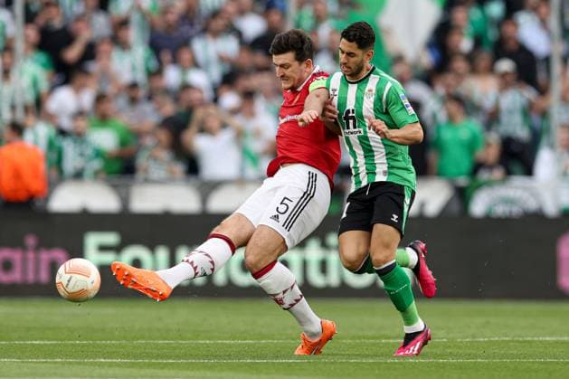 Mandatory Credit: Photo by Paul Currie Shutterstock (13820133w) Harry Maguire of Manchester United, ManU and Ayoze Perez of Real Betis Real Betis v Manchester United, UEFA Europa League, Round of 16, Second Leg, Football, Benito Villamarin Stadium, Seville, Spain - 16 Mar 2023 EDITORIAL USE ONLY No use with unauthorised audio, video, data, fixture lists, club league logos or live services. Online in-match use limited to 120 images, no video emulation. No use in betting, games or single club league player publications. Real Betis v Manchester United, UEFA Europa League, Round of 16, Second Leg, Football, Benito Villamarin Stadium, Seville, Spain - 16 Mar 2023 EDITORIAL USE ONLY No use with unauthorised audio, video, data, fixture lists, club league logos or live services. Online in-match use limited to 120 images, no video emulation. No use in betting, games or single club league player publications. Copyright: xPaulxCurrie Shutterstockx 13820133w
