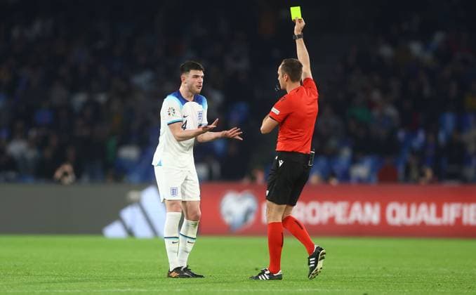 Mandatory Credit: Photo by Kieran McManus Shutterstock (13836561aj) Declan Rice of England is shown a yellow card Italy v England, UEFA European Championship, EM, Europameisterschaft 2024 Qualifying, Group C, Football, Stadio Diego Armando Maradona, Naples, Italy - 23 Mar 2023 EDITORIAL USE ONLY No use with unauthorised audio, video, data, fixture lists, club league logos or live services. Online in-match use limited to 120 images, no video emulation. No use in betting, games or single club league player publications. Italy v England, UEFA European Championship 2024 Qualifying, Group C, Football, Stadio Diego Armando Maradona, Naples, Italy - 23 Mar 2023 EDITORIAL USE ONLY No use with unauthorised audio, video, data, fixture lists, club league logos or live services. Online in-match use limited to 120 images, no video emulation. No use in betting, games or single club league player publications. Copyright: xKieranxMcManus Shutterstockx 13836561aj
