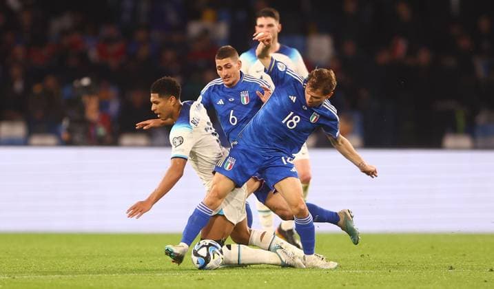 Mandatory Credit: Photo by Kieran McManus Shutterstock (13836561af) Jude Bellingham of England is fouled by Nicolò Barella of Italy Italy v England, UEFA European Championship, EM, Europameisterschaft 2024 Qualifying, Group C, Football, Stadio Diego Armando Maradona, Naples, Italy - 23 Mar 2023 EDITORIAL USE ONLY No use with unauthorised audio, video, data, fixture lists, club league logos or live services. Online in-match use limited to 120 images, no video emulation. No use in betting, games or single club league player publications. Italy v England, UEFA European Championship 2024 Qualifying, Group C, Football, Stadio Diego Armando Maradona, Naples, Italy - 23 Mar 2023 EDITORIAL USE ONLY No use with unauthorised audio, video, data, fixture lists, club league logos or live services. Online in-match use limited to 120 images, no video emulation. No use in betting, games or single club league player publications. Copyright: xKieranxMcManus Shutterstockx 13836561af