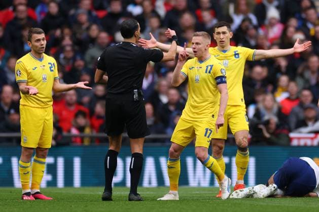 Mandatory Credit: Photo by Shutterstock (13844509x) Oleksandr Zinchenko of Ukraine confronts the referee England v Ukraine, UEFA European Championship, EM, Europameisterschaft 2024 Qualifying, Group C, Football, Wembley Stadium, London, UK - 26 Mar 2023 EDITORIAL USE ONLY No use with unauthorised audio, video, data, fixture lists, club league logos or live services. Online in-match use limited to 120 images, no video emulation. No use in betting, games or single club league player publications. England v Ukraine, UEFA European Championship 2024 Qualifying, Group C, Football, Wembley Stadium, London, UK - 26 Mar 2023 EDITORIAL USE ONLY No use with unauthorised audio, video, data, fixture lists, club league logos or live services. Online in-match use limited to 120 images, no video emulation. No use in betting, games or single club league player publications. Copyright: xShutterstockx 13844509x