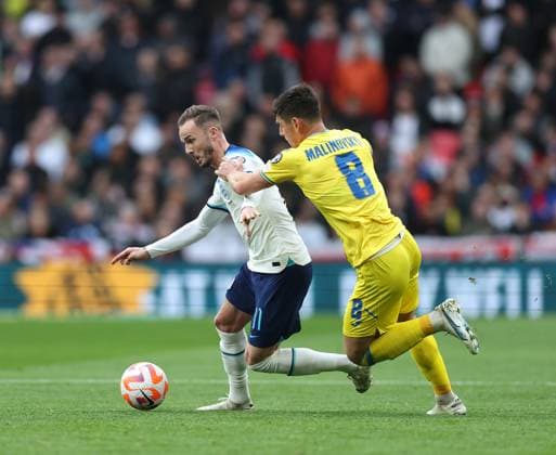 London, England, 26th March 2023. James Maddison of England with Ruslan Malinovskiy of Ukraine during the UEFA European Championship, EM, Europameisterschaft Qualifying match at Wembley Stadium, London. Picture credit should read: David Klein Sportimage EDITORIAL USE ONLY. No use with unauthorised audio, video, data, fixture lists, club league logos or live services. Online in-match use limited to 120 images, no video emulation. No use in betting, games or single club league player publications. SPI-2324-0015