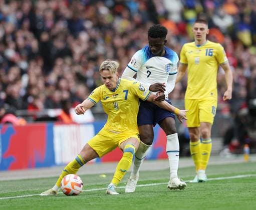 London, England, 26th March 2023. Bukayo Saka of England with Mykhailo Mudryk of Ukraine during the UEFA European Championship, EM, Europameisterschaft Qualifying match at Wembley Stadium, London. Picture credit should read: David Klein Sportimage EDITORIAL USE ONLY. No use with unauthorised audio, video, data, fixture lists, club league logos or live services. Online in-match use limited to 120 images, no video emulation. No use in betting, games or single club league player publications. SPI-2324-0047
