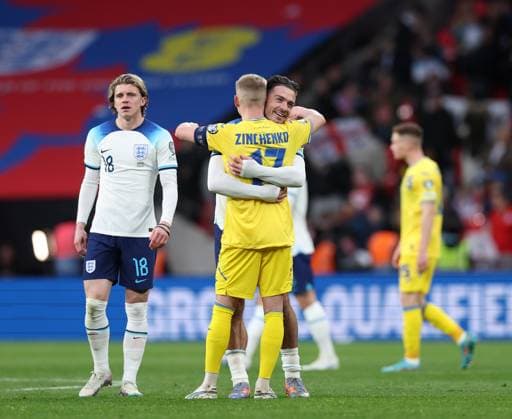 London, England, 26th March 2023. Jack Grealish of England hugs Oleksandr Zinchenko of Ukraineduring the UEFA European Championship, EM, Europameisterschaft Qualifying match at Wembley Stadium, London. Picture credit should read: David Klein Sportimage EDITORIAL USE ONLY. No use with unauthorised audio, video, data, fixture lists, club league logos or live services. Online in-match use limited to 120 images, no video emulation. No use in betting, games or single club league player publications. SPI-2324-0053
