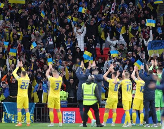 London, England, 26th March 2023. Ukranian fans applaud their side during the UEFA European Championship, EM, Europameisterschaft Qualifying match at Wembley Stadium, London. Picture credit should read: David Klein Sportimage EDITORIAL USE ONLY. No use with unauthorised audio, video, data, fixture lists, club league logos or live services. Online in-match use limited to 120 images, no video emulation. No use in betting, games or single club league player publications. SPI-2324-0056