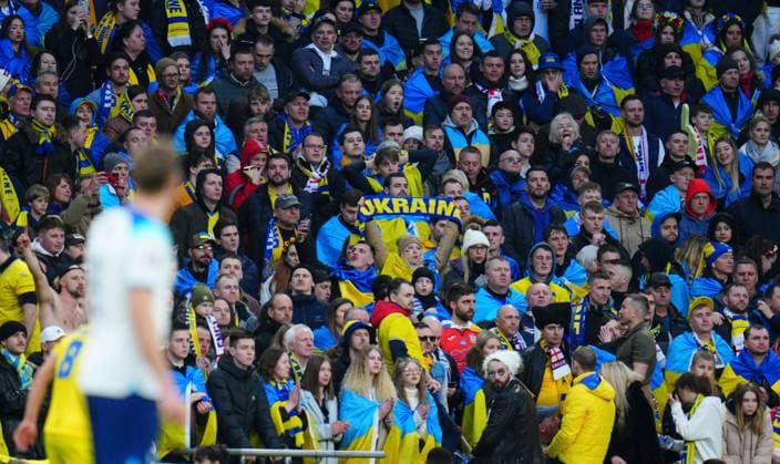 Mandatory Credit: Photo by Javier Garcia Shutterstock (13840577dk) Ukraine fans England v Ukraine, UEFA European Championship, EM, Europameisterschaft 2024 Qualifying, Group C, Football, Wembley Stadium, London, UK - 26 Mar 2023 EDITORIAL USE ONLY No use with unauthorised audio, video, data, fixture lists, club league logos or live services. Online in-match use limited to 120 images, no video emulation. No use in betting, games or single club league player publications. England v Ukraine, UEFA European Championship 2024 Qualifying, Group C, Football, Wembley Stadium, London, UK - 26 Mar 2023 EDITORIAL USE ONLY No use with unauthorised audio, video, data, fixture lists, club league logos or live services. Online in-match use limited to 120 images, no video emulation. No use in betting, games or single club league player publications. Copyright: xJavierxGarcia Shutterstockx 13840577dk