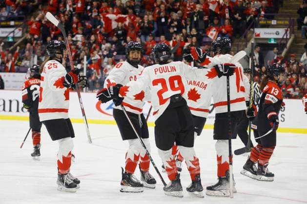 April 8, 2023, BRAMPTON, ON, CANADA: Canada forward Sarah Nurse (20) celebrates a goal with defender Jaime Bourbonnais (25), forward Marie-Philip Poulin (29) and forward Brianne Jenner (19) during first period IIHF WomenöÄÃ s World Hockey Championship hockey action against Japan in Brampton, Ont., on Saturday, April 8, 2023. Canada News - April 8, 2023 - ZUMAc35_ 20230408_zaf_c35_032 Copyright: xColexBurstonx