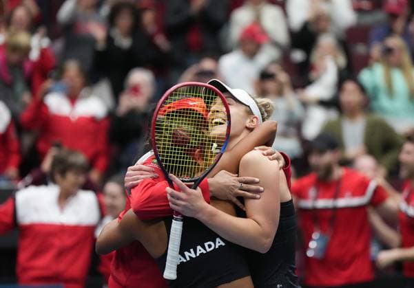 April 15, 2023, VANCOUVER, BC, CANADA: Canada s Gabriela Dabrowski, right, Leylah Fernandez, front left, and captain Heidi El Tabakh celebrate after defeating Belgium s Kirsten Flipkens and Greet Minnen during a Billie Jean King Cup qualifiers doubles match, in Vancouver, on Saturday, April 15, 2023. Canada won three of the five matches to win the qualifying tie and advance to the 2023 Billie Jean King Cup finals. Canada News - April 15, 2023 - ZUMAc35_ 20230415_zaf_c35_220 Copyright: xDarrylxDyckx
