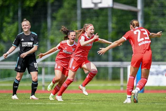 Franziska Mai (Nürnberg, 18) enttäuscht schauend, Enttäuschung, Frustration, disappointed, pessimistisch, Sophia Weixler (FCB, 16) Marlene Wild (FCB, 3) Karolina Lea Vilhjalmsdottir (FCB, 23) mit Torjubel, Jubel, Torjubel, Torerfolg, celebrate the goal, goal, celebration, Jubel ueber das Tor zum 1:0 durch Marlene Wild (FCB, 3) , optimistisch, Action, Aktion, 21.05.2023, Aschheim (Deutschland), Fussball,2. Frauen-Bundesliga, FC Bayern München II - 1. FC Nürnberg, DFB DFL REGULATIONS PROHIBIT ANY USE OF PHOTOGRAPHS AS IMAGE SEQUENCES AND OR QUASI-VIDEO.