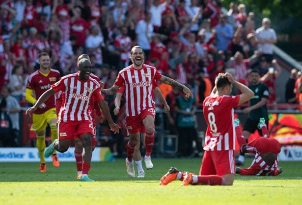 Fussball, Herren, Saison 2022 2023, 1. Bundesliga (34. Spieltag), 1. FC Union Berlin - SV Werder Bremen, v. l. Jerome Roussillon (1. FC Union Berlin), Christopher Trimmel (1. FC Union Berlin), Rani Khedira (1. FC Union Berlin), Jubel nach Abpfiff, 27.05.2023, Copyright: xSebastianxRäppold MatthiasxKochx